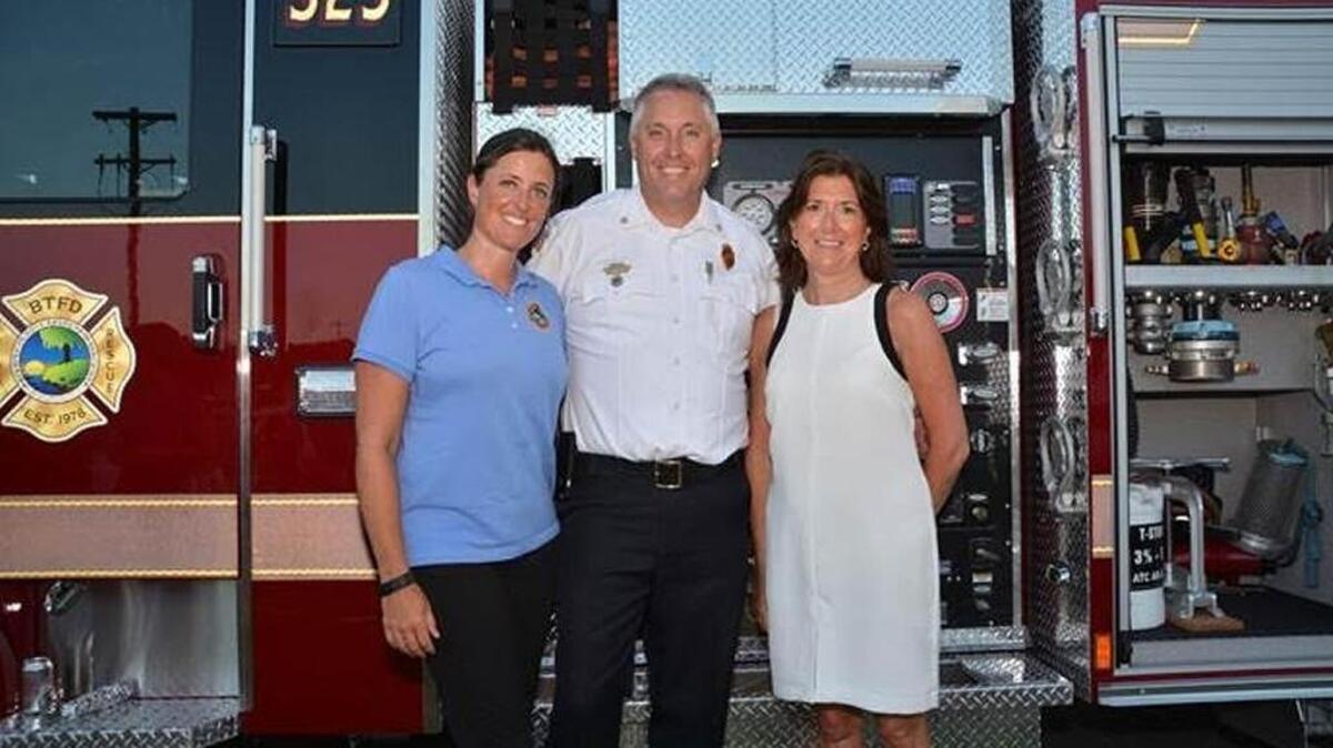 Julie Kizer CPR coordinator for Bluffton Township Fire District, Deputy Chief Rick Cramer and Trudie Lobban, founder of Arrhythmia Alliance
