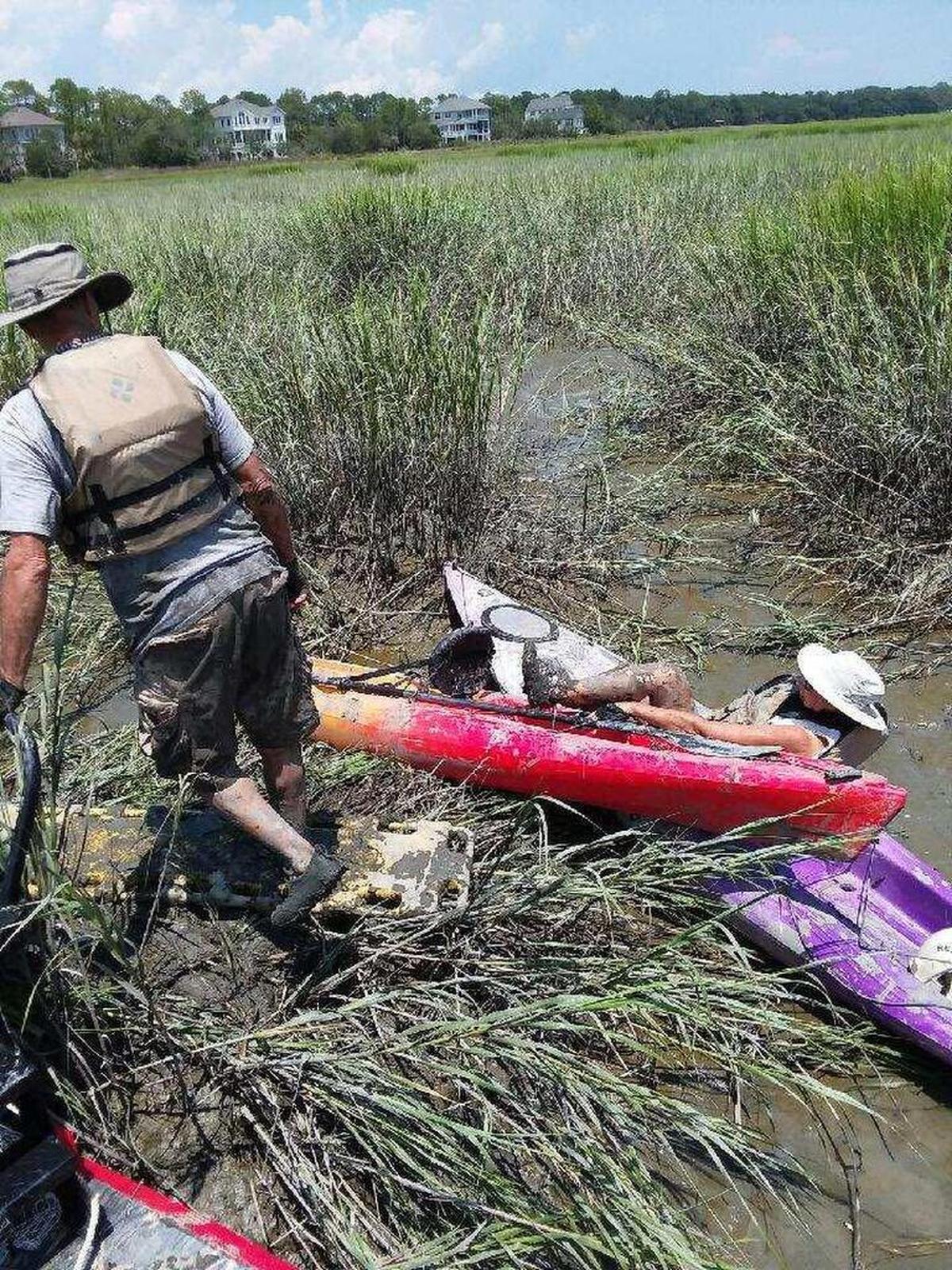 Two kayakers, covered in pluff mud and stranded in Broad Creek at low tide off Hilton Head Island, were rescued Thursday afternoon by Beaufort Water Search and Rescue’s airboat. Other agencies that responded, including the Town of Hilton Head Island Fire & Rescue Division, did not have the equipment to reach them.