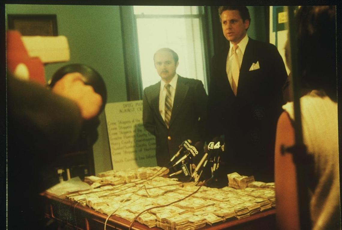 Then U.S. Attorney Henry Dargan McMaster at a news conference showing cash confiscated in the Operation Jackpot investigation in the early 1980s.