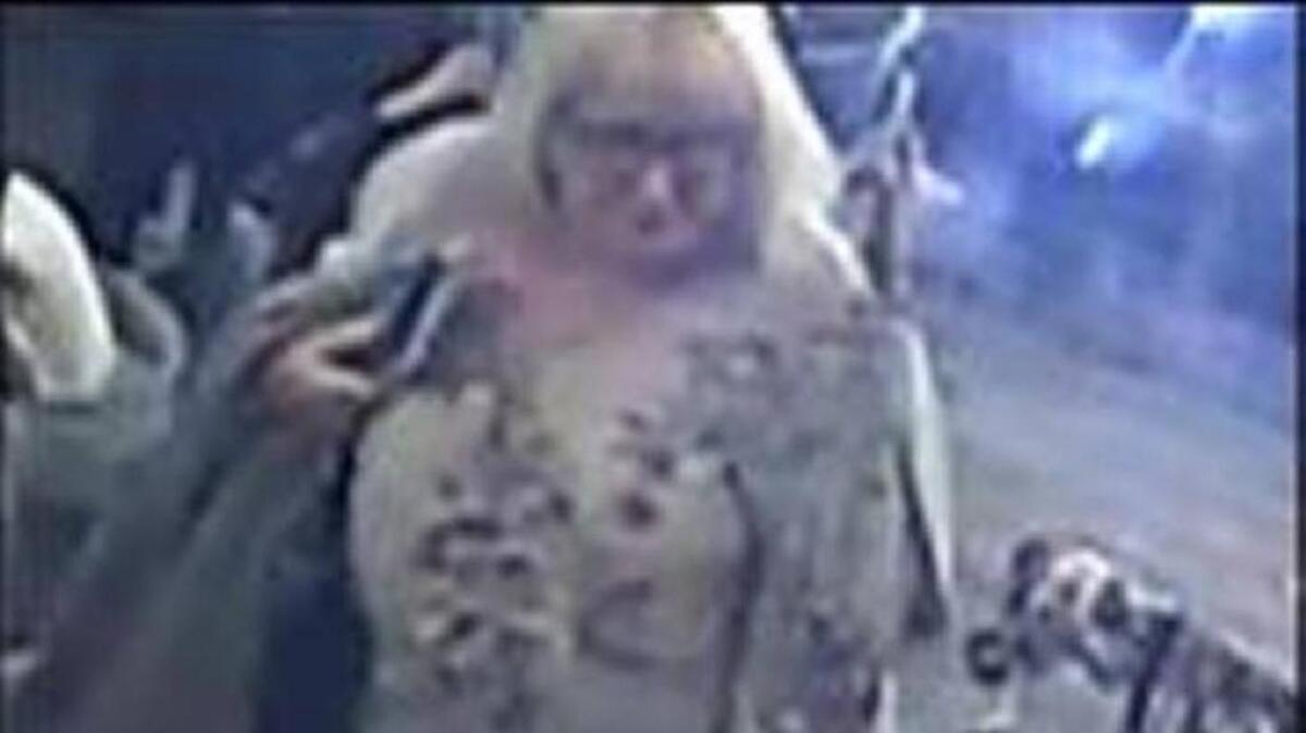 A surveillance video captured an image a woman suspected of shoplifting clothes from a Hilton Head store.