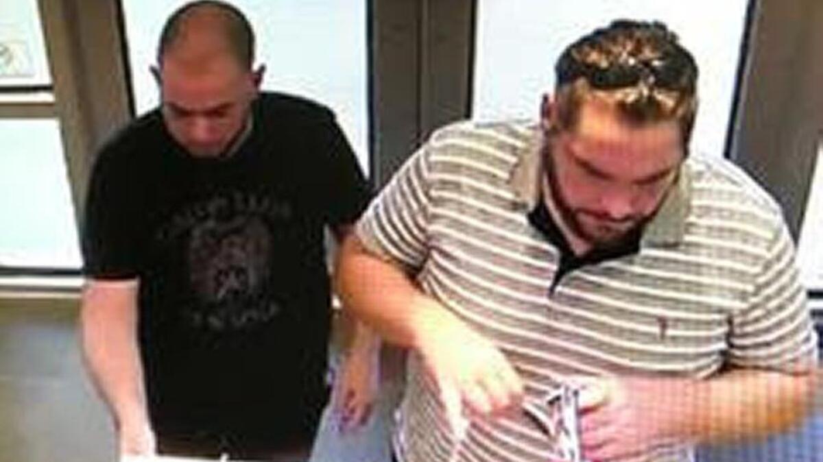 These men are suspected of shoplifting $2450 worth of merchandise from two sun glass shops.