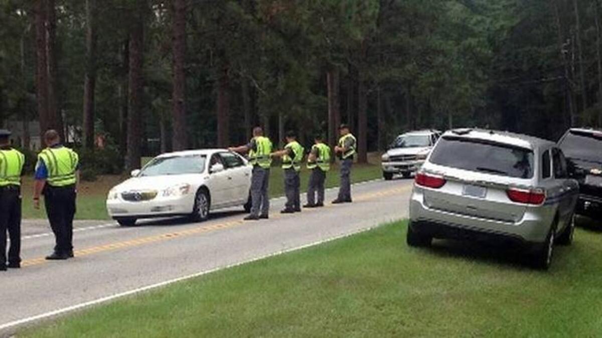 S.C .Highway Patrol troopers working a sobriety checkpoint.