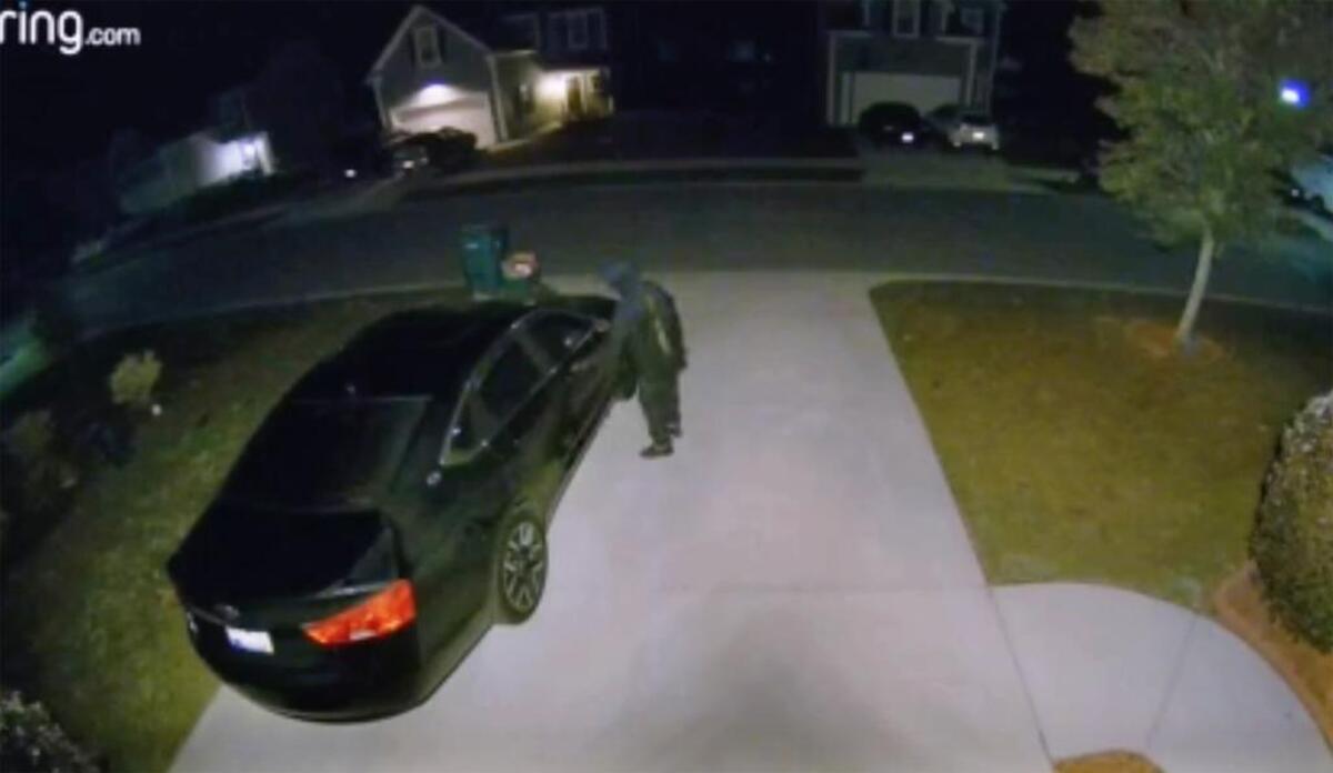 This still from a surveillance camera shows a subject trying the door of a car in the Southern Oaks neighborhood of Bluffton on Monday morning. The Bluffton Police Department, responding to a report of vehicle break-ins in the area, ended up chasing the suspects at speeds over 100 mph before giving up the chase at the Savannah bridge.