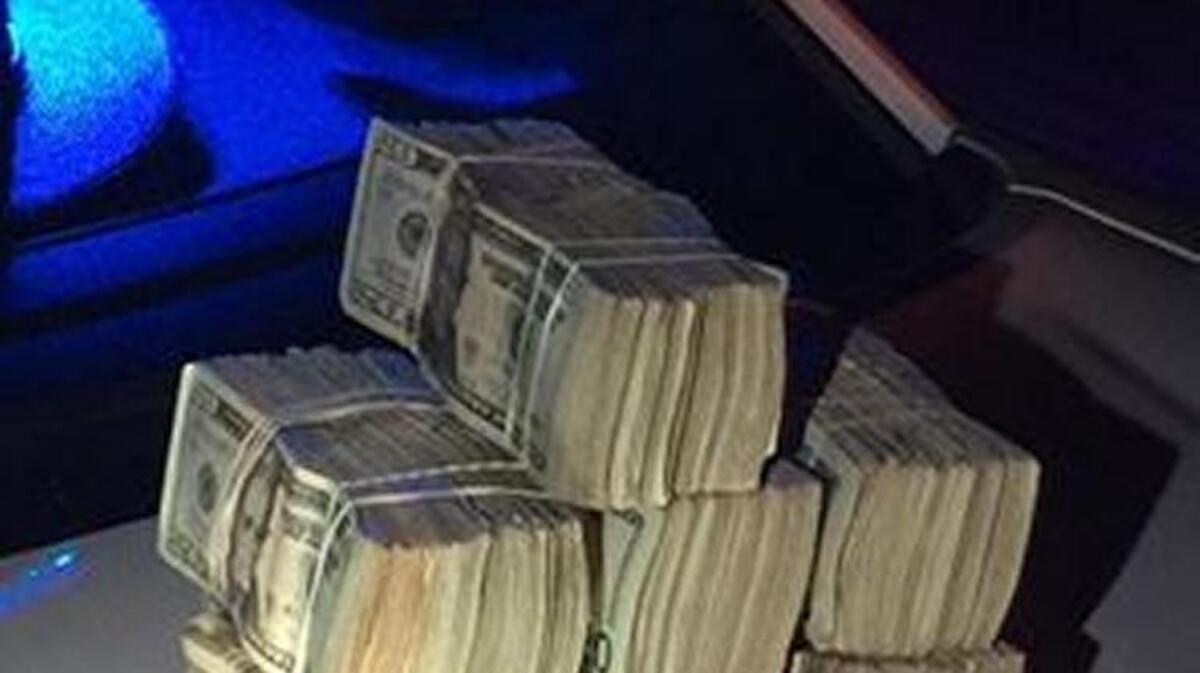 Cash seized in the incident.