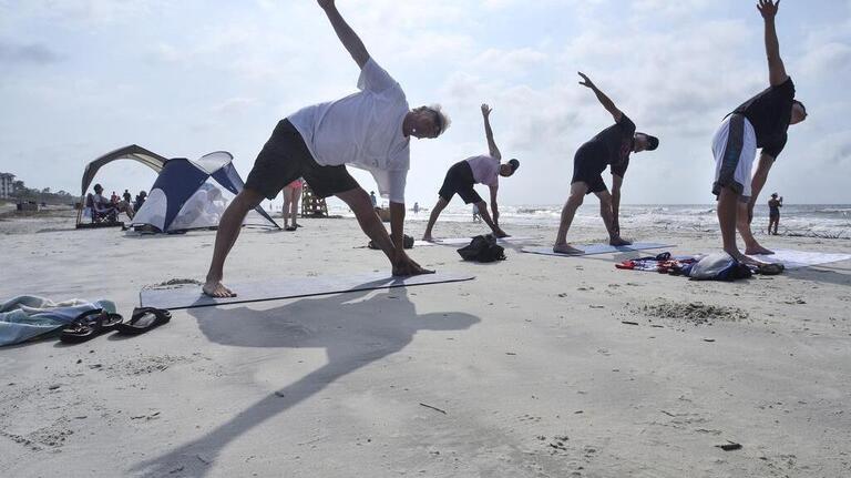 Photos: Free yoga on Hilton Head's Coligny Beach