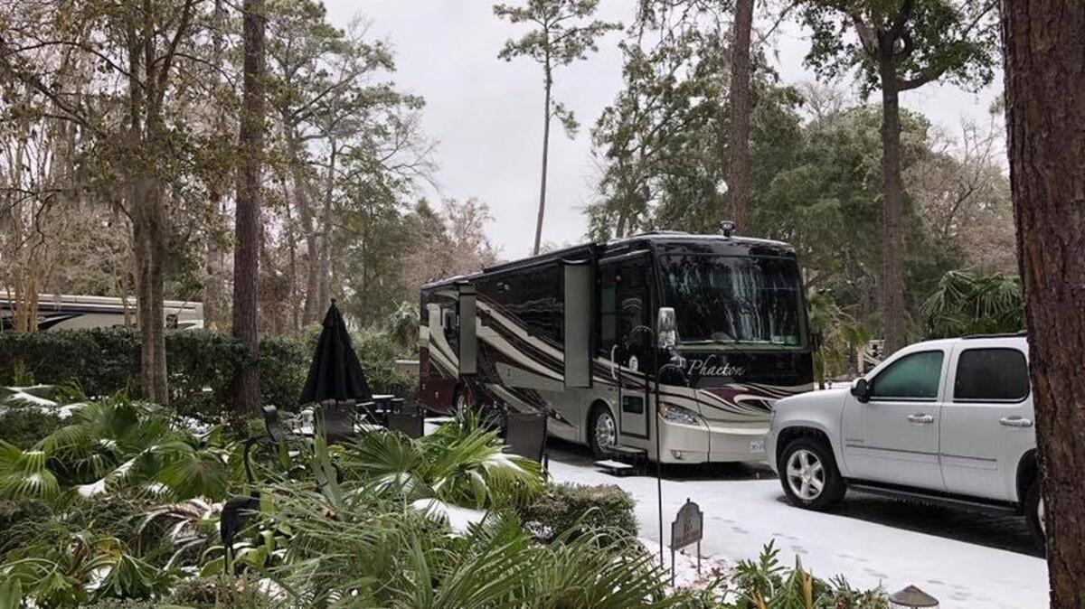 John Eibeck’s mobile home stands in an RV park on Hilton Head Island, surrounded by snow on Thursday, Jan. 4, 2018. Eibeck drove to Hilton Head in hopes of having a warm vacation in January, but instead encountered a winter storm.