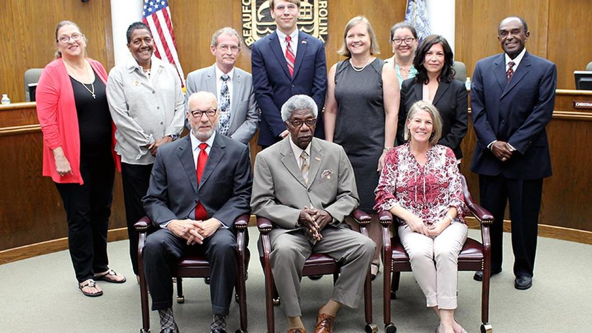 (Back row, from left) Board members Mary Cordray, Cynthia Gregory-Smalls, John Dowling, Joseph Dunkle, Christina Gwozdz, Evva Anderson, JoAnn Orischak, Bill Payne (Front row, from left) Board secretary David Striebinger, board chairman Earl Campbell, board vice-chairwoman Geri Kinton