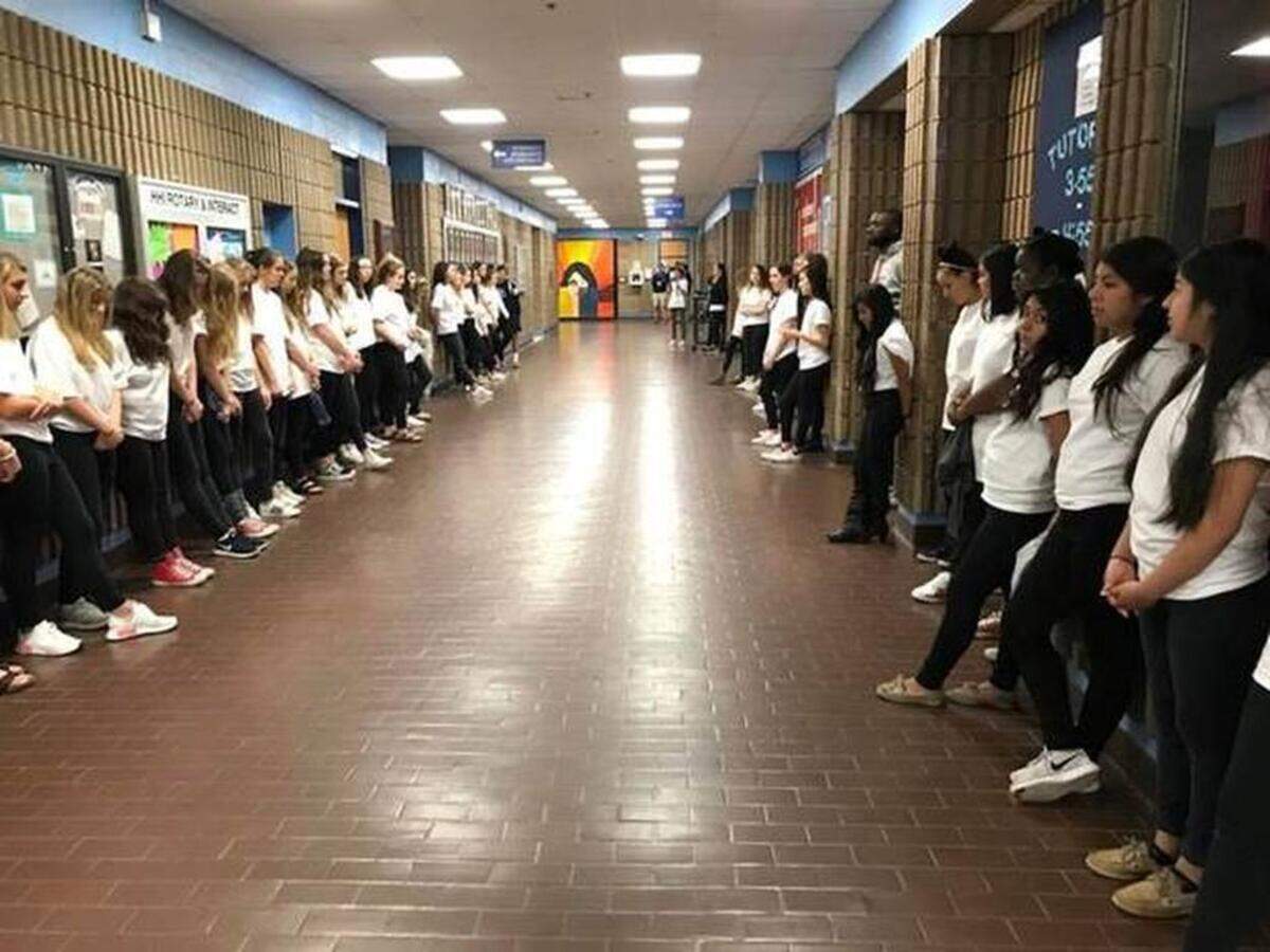 Hilton Head Island High School students lined the school's hallways as part of its National Walkout event Wednesday, March 14, 2018.