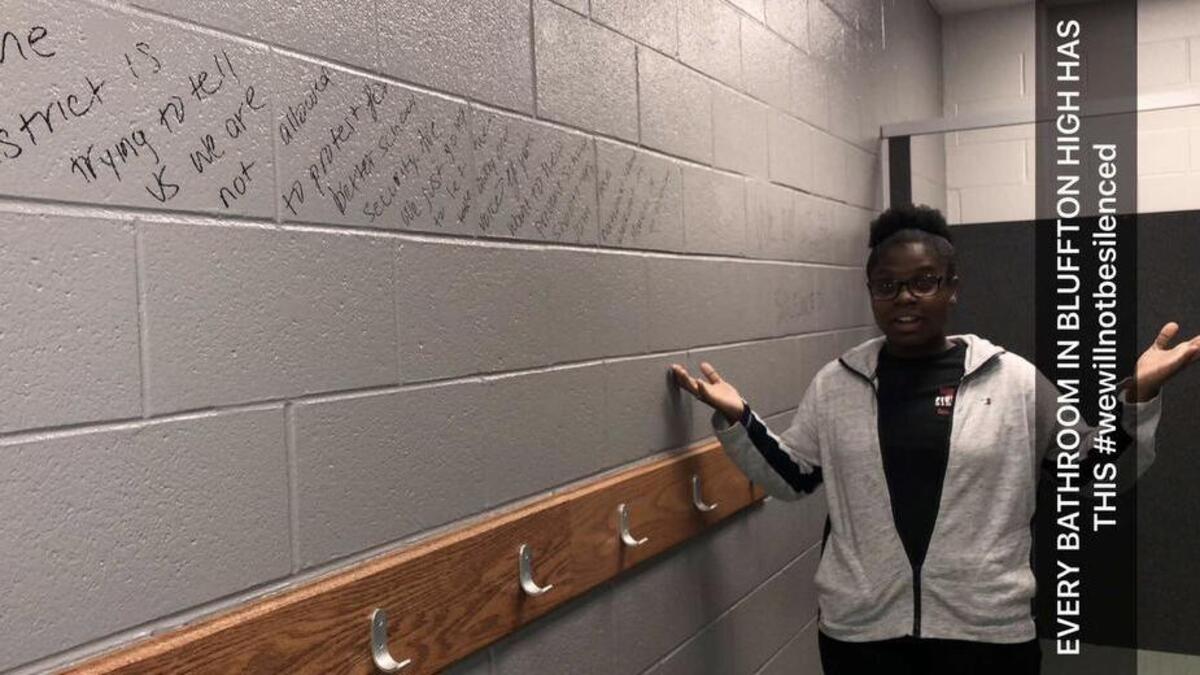 Desiree Bailey, a senior, photographed Friday, February 23, 2018 in one of Bluffton High School’s bathrooms where sophomore Ami Hughey wrote a message to students asking for them to participate in the national walkout planned Mar. 14 to protest school shootings.