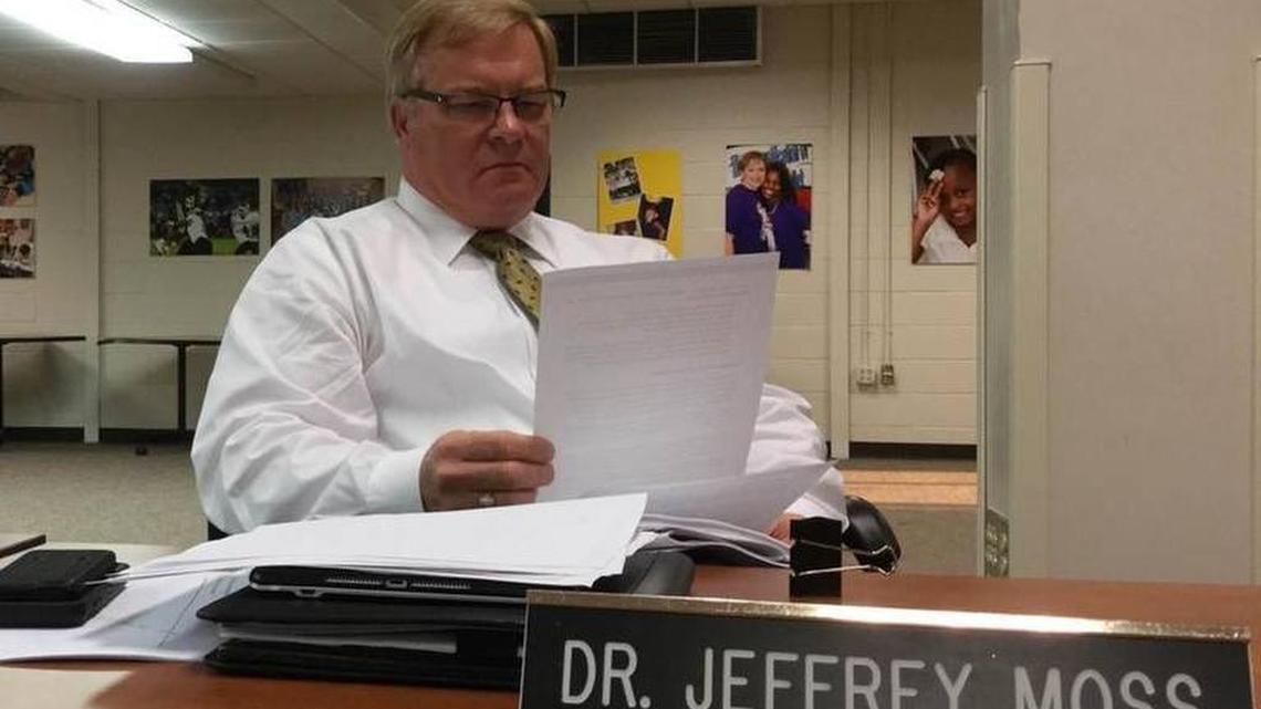 Beaufort County schools superintendent Jeff Moss reviewed paperwork while Beaufort County Board of Education members discussed his annual performance review in executive session last year.