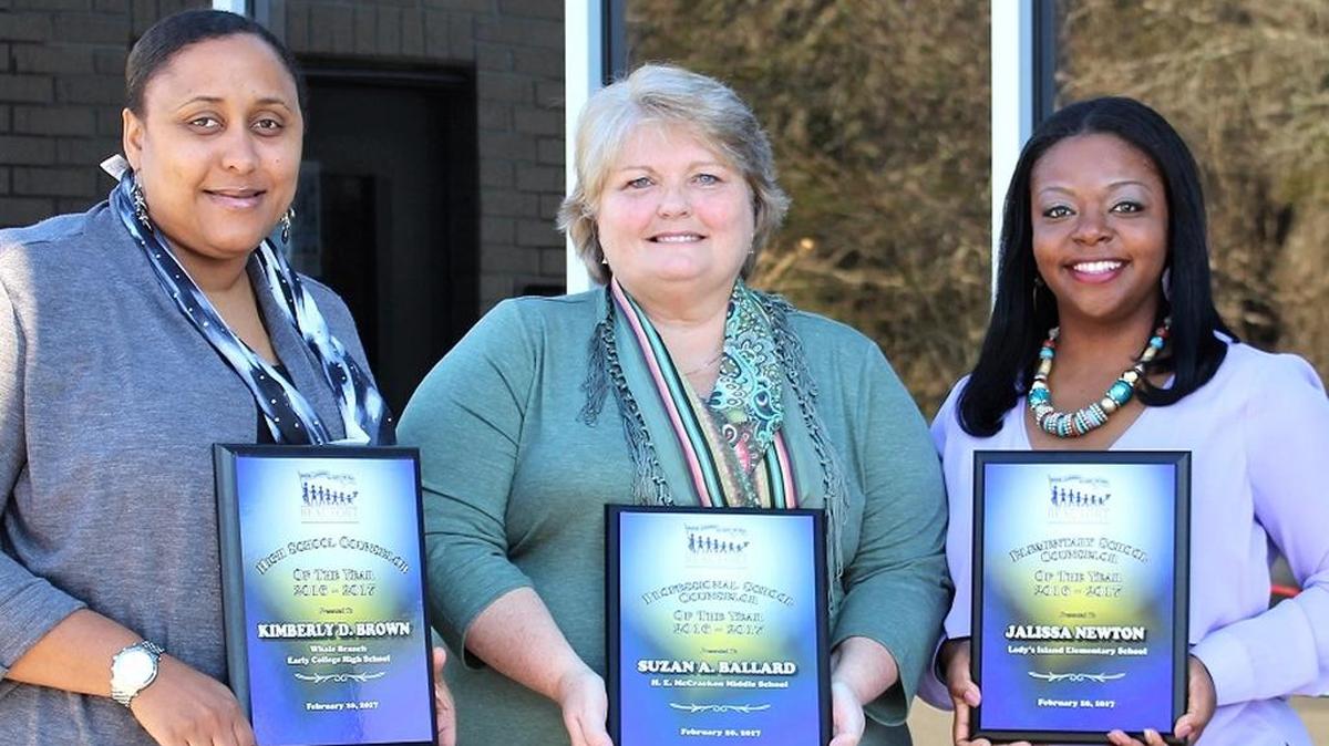 McCracken Middle School’s Suzan Ballard, named Counselor of the Year in Beaufort County schools, is flanked by fellow winners. Kimberly Brown, left, of Whale Branch Early College High, was named the top high school counselor and Jalissa Newton, right, of Lady’s Island Elementary, won for elementary schools.