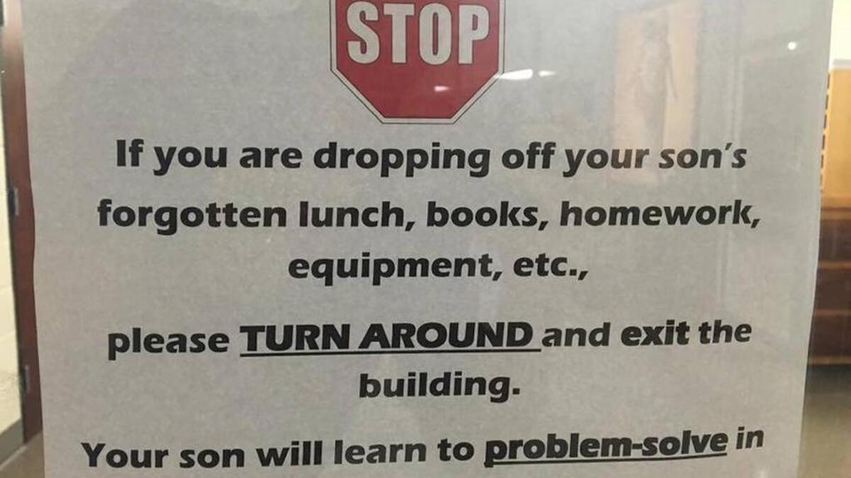Principal Steve Straessle posted this sign on a front door at the Catholic School for Boys in Little Rock, Arkansas. The sign, shared on Facebook more than 120,000 times, has proven polarizing. Handout Handout