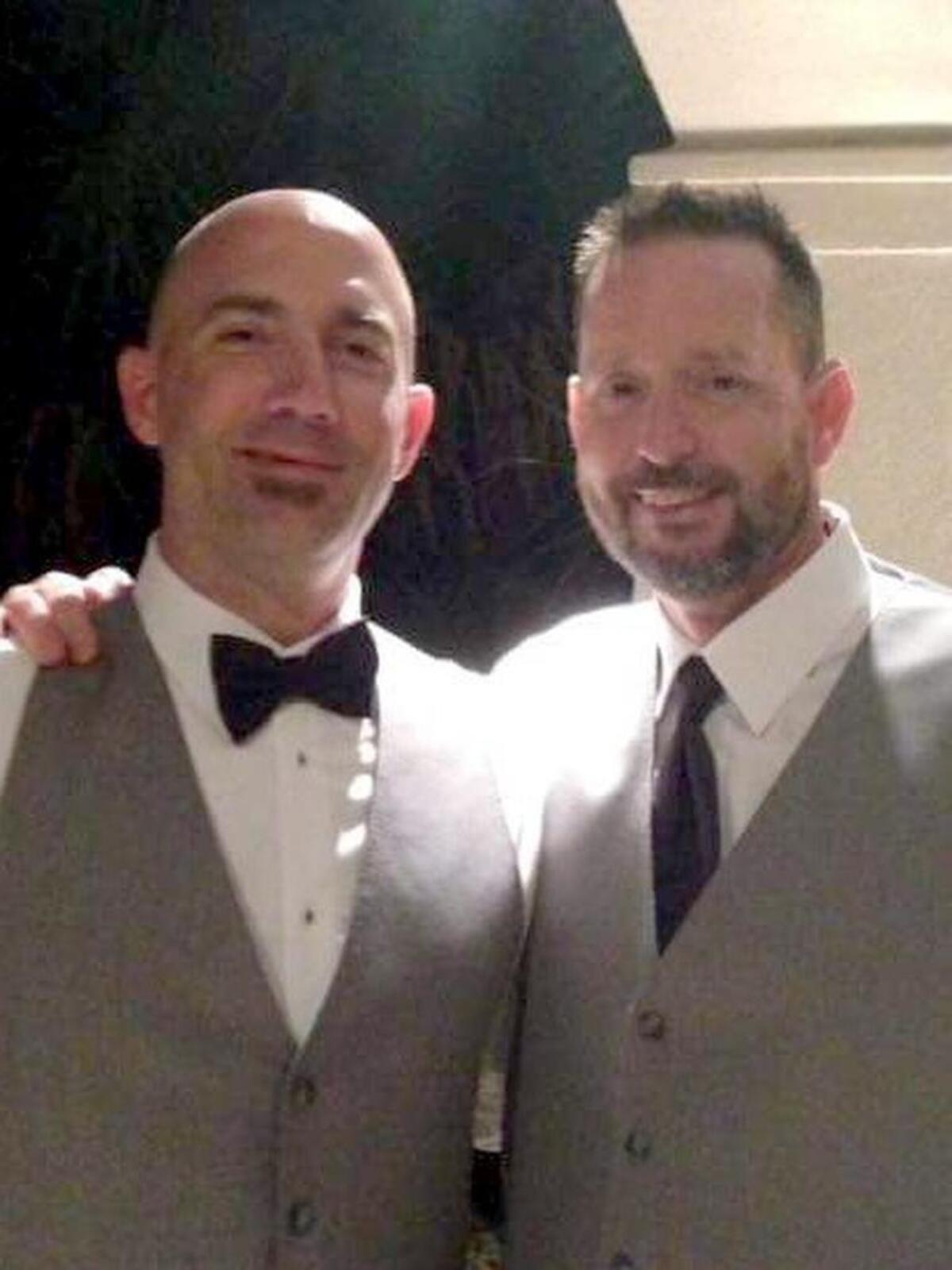Jaison Hrobar, left and Joe Naughton are photographed at Naughton's wedding in 2016. The two have co-founded Greener Grass, a non-profit organization that provides assistance to those suffering from drug or alcohol addiction.