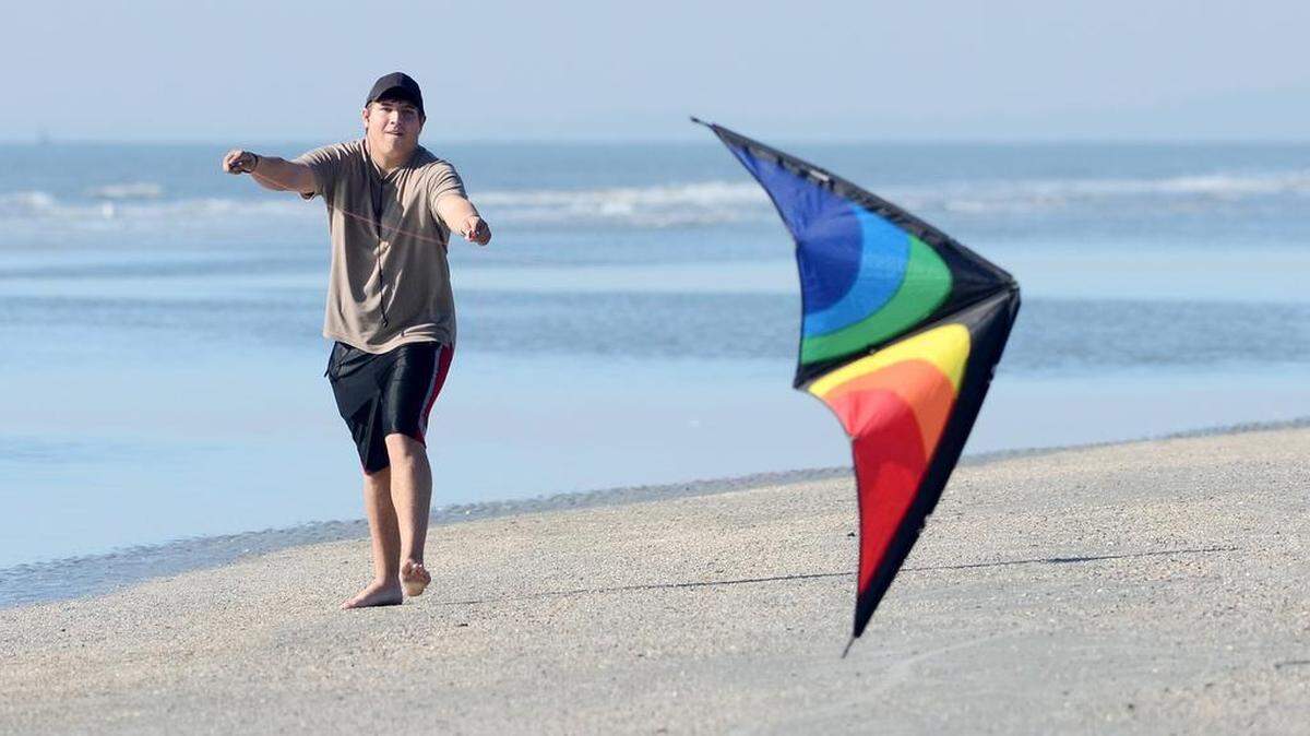 Caleb Pohlman, visiting Hilton Head from North Carolina, flies his stunt kite at Coligny Beach Park on Feb. 1, 2016. Though the traditional time for kite-flying -- March -- is still a month away, it felt like March on the beach with highs in the 60s. Further inland, it was even warmer.