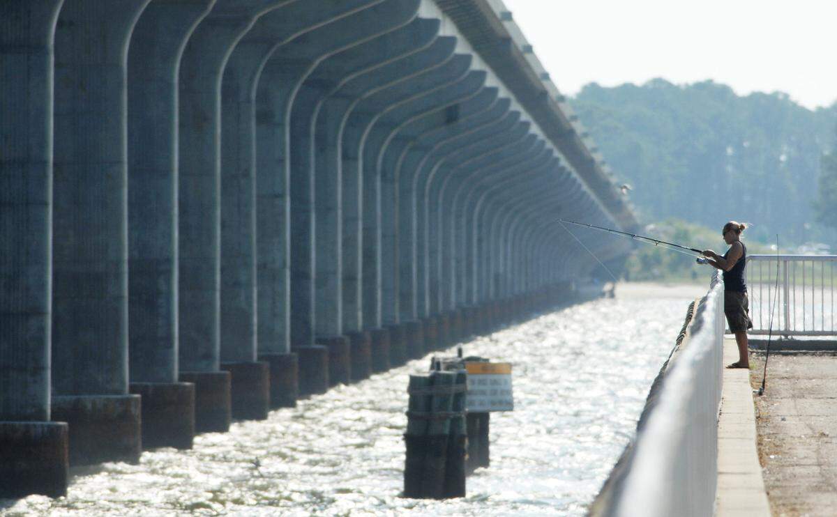 Miranda Ward of Savannah fishes on the Broad River.