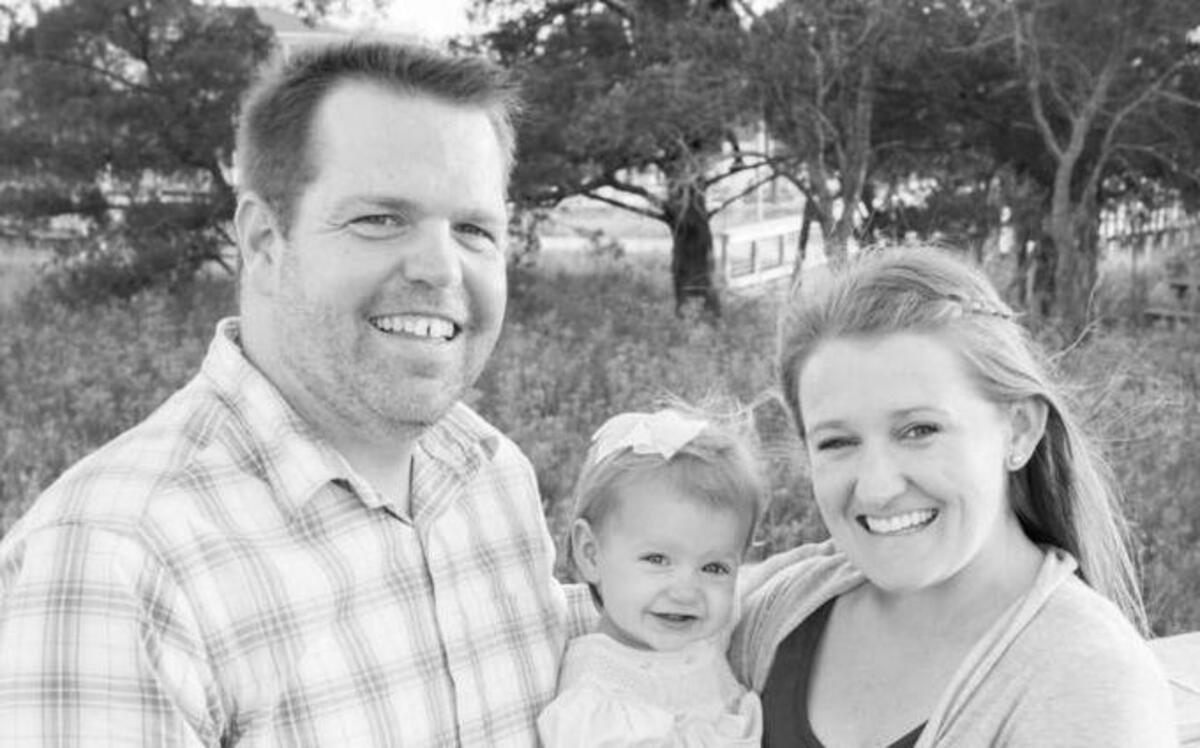 Jason Suddeth, right, with wife Alison and daughter Adeline.