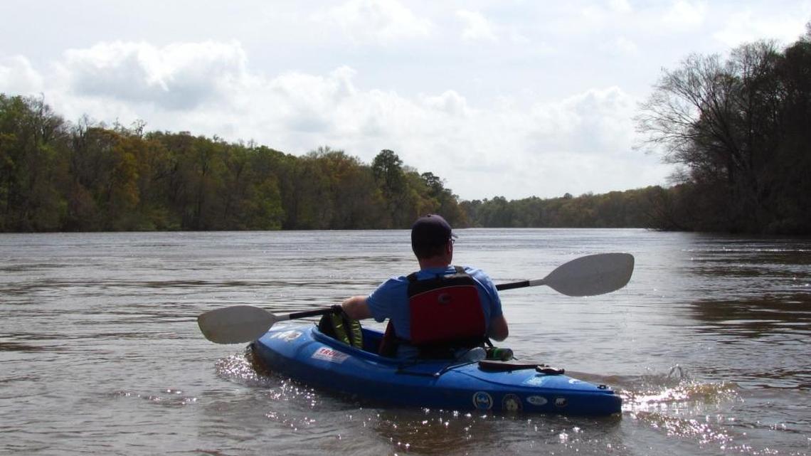Sean Jansen of Bluffton paddles down the Altamaha River near Darien, Ga.