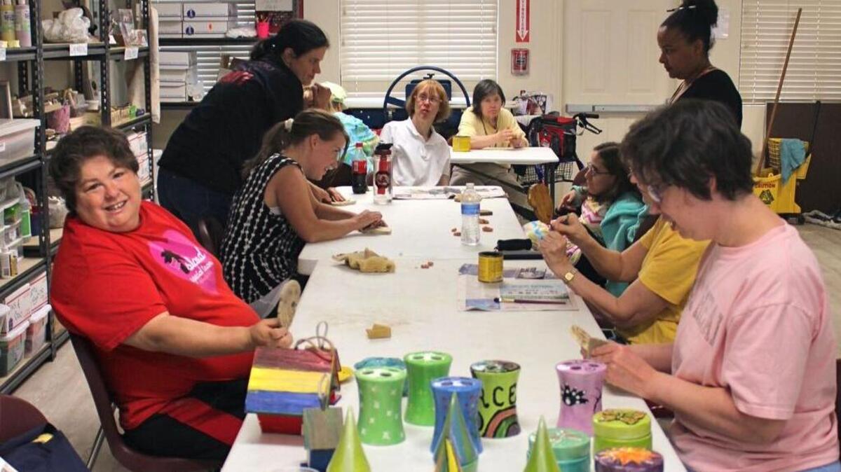 PEP members learn pottery and woodworking and sell the finished products.