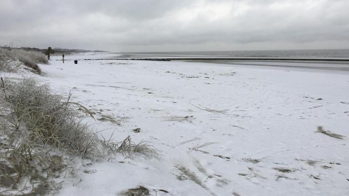 Snow cover the Hilton Head beachfront on Wednesday, Jan. 3, 2018.