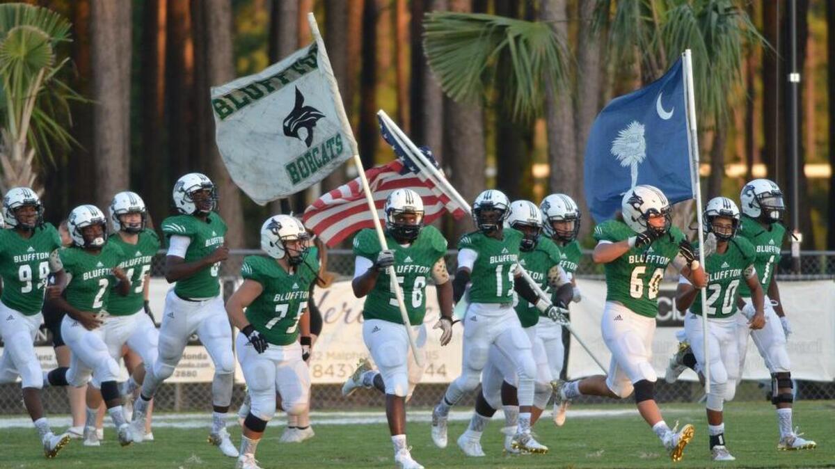 The May River High School Sharks football team plays its first ever game with its crosstown rival, the Bluffton Bobcats, at Bluffton High School on Friday, Aug. 26, 2016.
