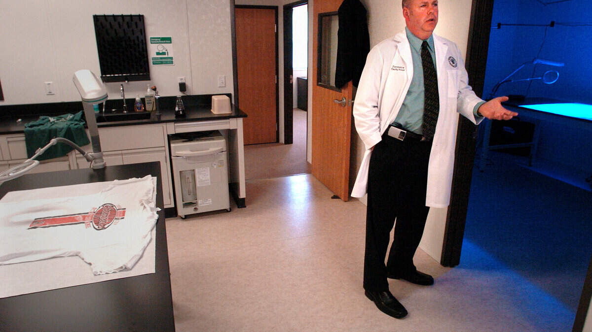Beaufort County Sheriff's Office DNA analyst Timothy French describes some of the benefits of the new Forensic Services Laboratory during an open house Tuesday.  The $1 million lab will be able to process DNA evidence in less than 30 days, which will reduce the agency's dependence on the S.C. Law Enforcement Division lab in Columbia.