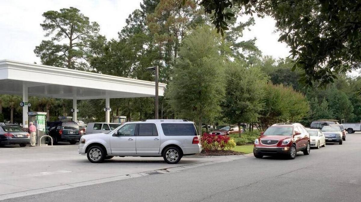 Cars wait in line to fill up as they back up onto U.S. 278 in greater Bluffton at the Parker’s Gas Station in the Home Depot shopping center on Tuesday. S.C. Gov Nikki Haley has called for an evacuation of coastal communities beginning Wednesday at 3 p.m. as Hurricane Matthew moves closer to South Carolina.