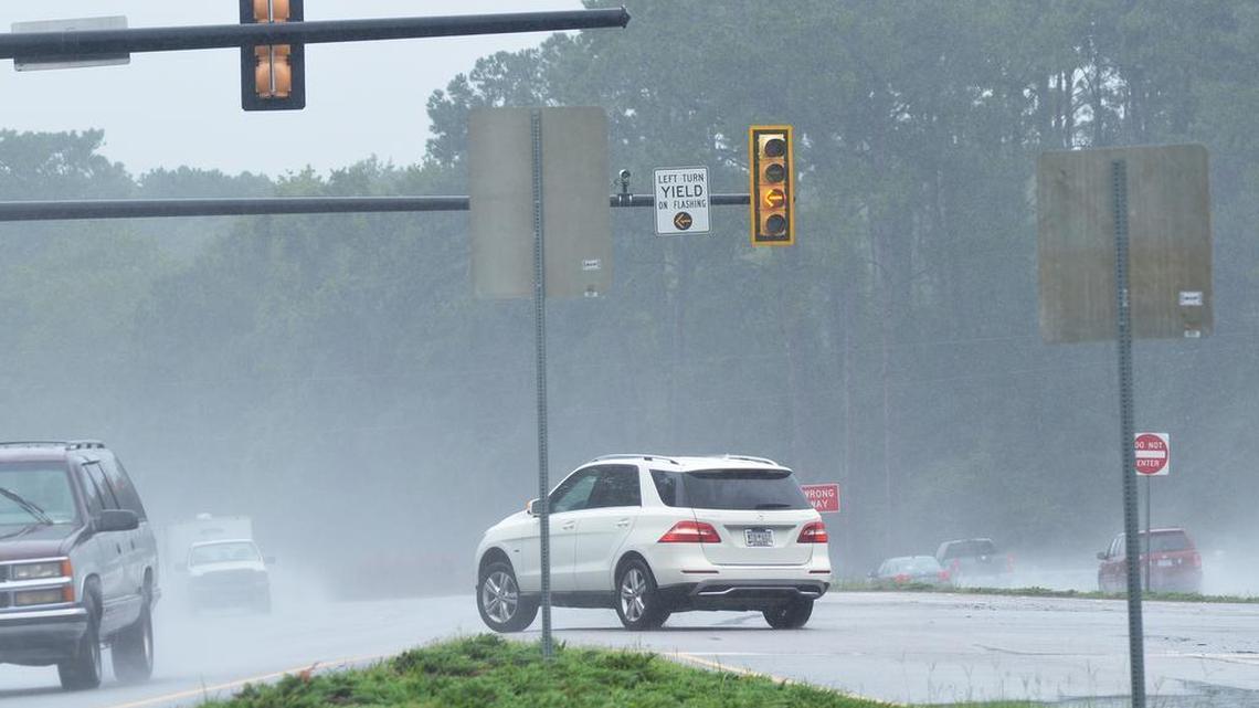 A vehicle makes a left turn through a break in oncoming traffic on the blinking yellow left turn light from westbound U.S. 278 onto Buck Island Road on Thursday morning.