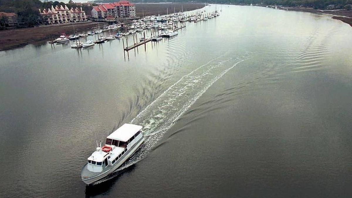 A ferry boat passes under the Charles E. Fraser Bridge on Hilton Head Island. Staff photo