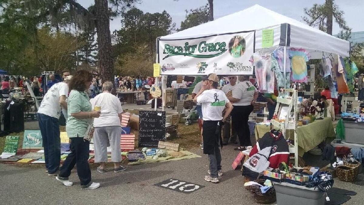 With its awning and a location in the center of Hilton Head High School’s parking lot, the Grace Sulak Foundation booth was hard to miss on March 25, 2017.