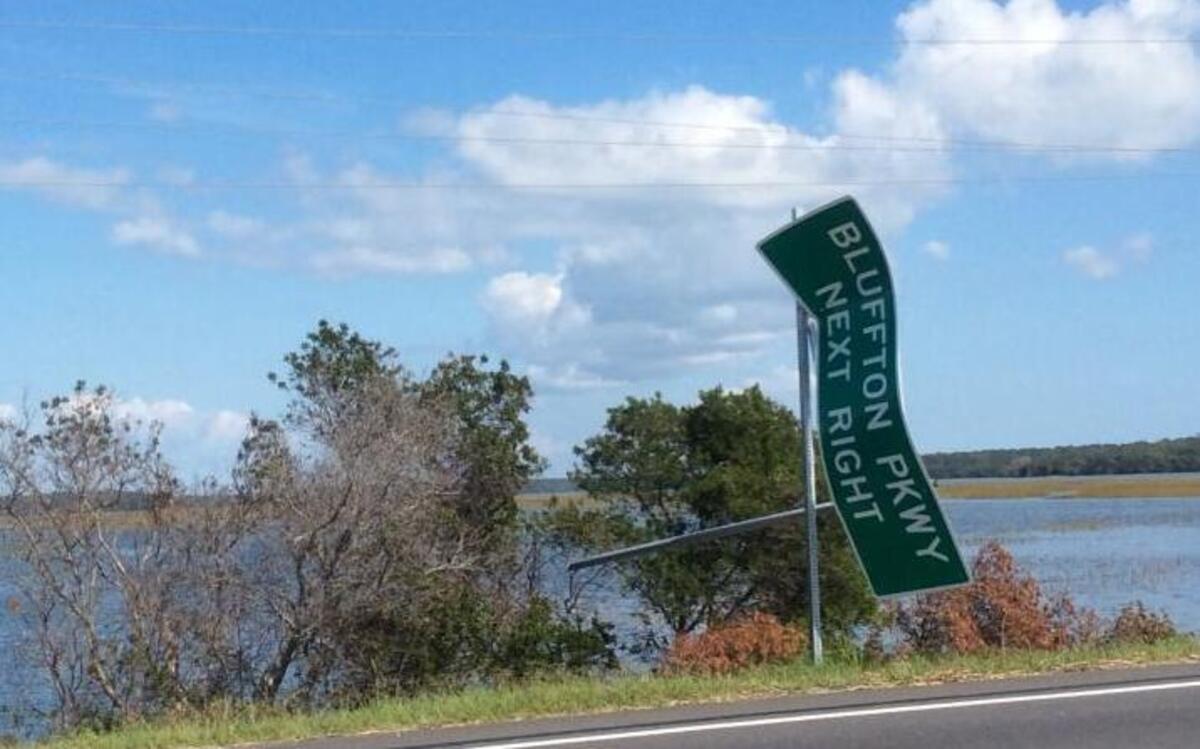 A sign for the Bluffton Parkway on U.S. 278 just off Hilton Head Island still stands contorted and twisted backward on Oct. 20, 2016 from the winds of Hurricane Matthew almost two weeks earlier.