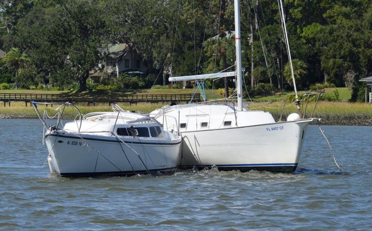 These two sailboats moored in Broad Creek have become entangled with each other in this photo taken on Wednesday.