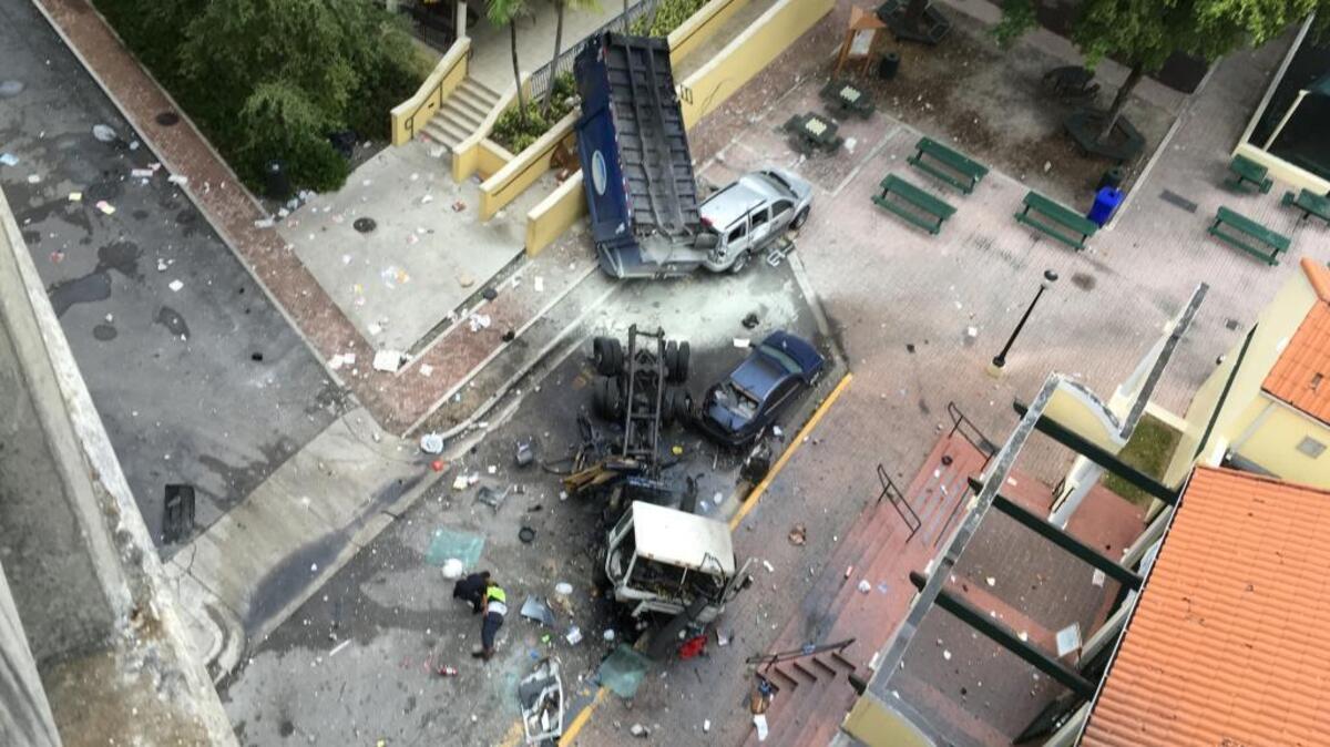 A view from I-95 near downtown Miami, where a tractor-trailer apparently fell onto Southwest Seventh Street late Monday afternoon on Feb. 15, 2016. Authorities say driver Kaseem Smith survived the crash and was rushed to Jackson Memorial Ryder Trauma Center.