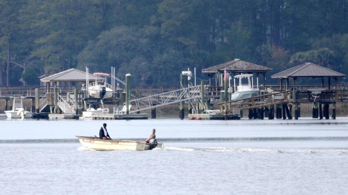 A boat heads out of the Bluffton Oyster Co. into the May River in Old Town Bluffton on Jan. 27, 2016.