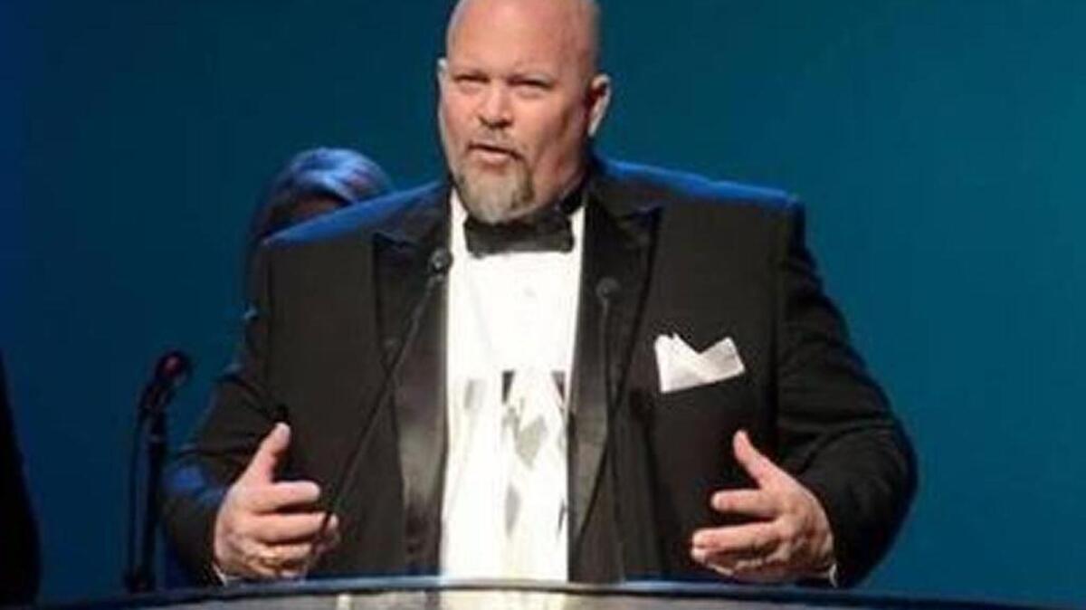 Mike Covert accepts the award when his business, Covert Aire, was named the Bluffton Regional Business Council Member of the Year at the Hilton Head Island-Bluffton Chamber of Commerce ball Feb. 27, 2016.