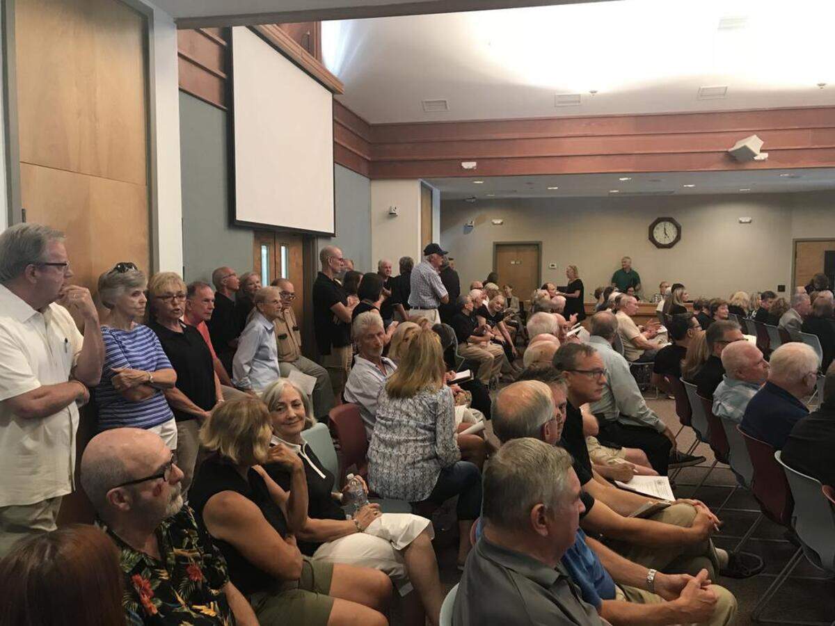 A large crowd gathered at Town Hall on Tuesday, June 5, 2018, for Town Council’s discussion of an ArborNature lease agreement. The Town Clerk informed the crowd some would need to stand in the hallway for the meeting because the meeting room was over capacity.