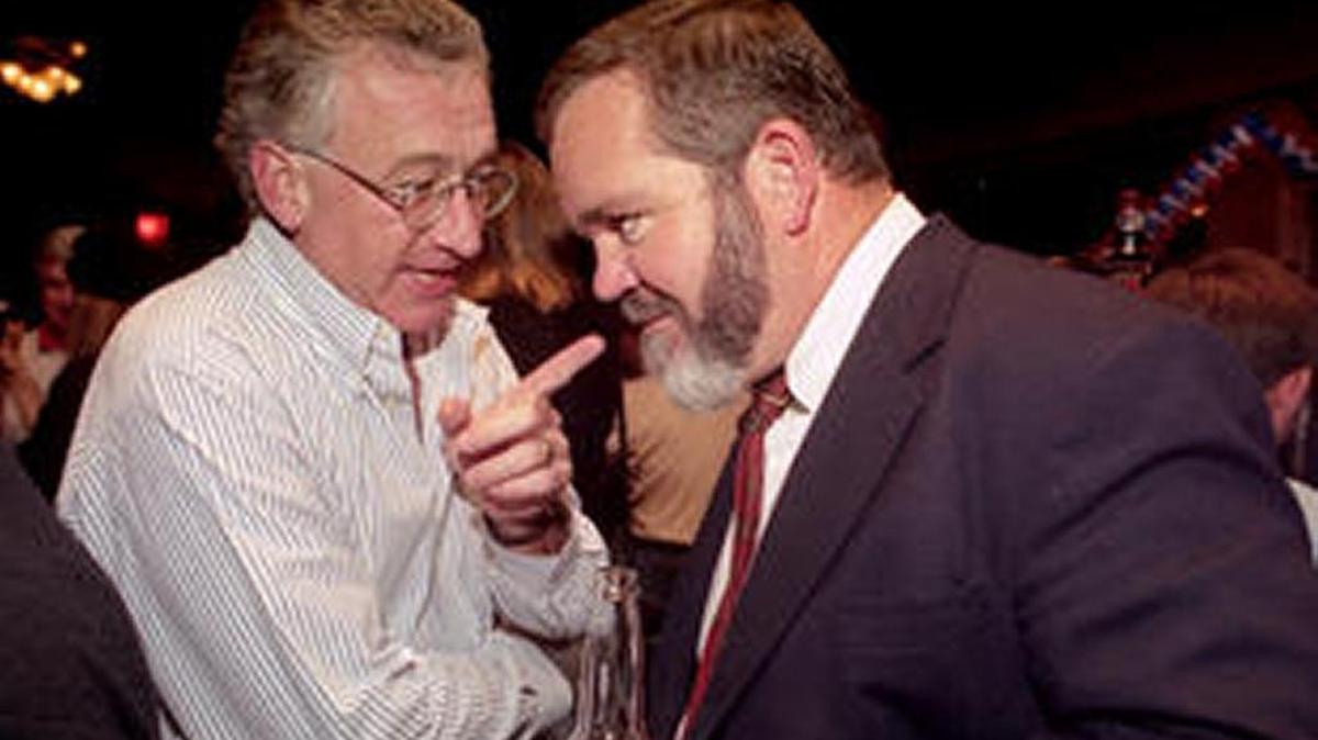 Mayoral candidate supporter Bill Thomas, left, talks with Tom Peeples at Remy's Nov. 7, 1995. Peeples received the most votes in a four-way election, facing Kate Keep in a runoff election. Peeples won the race by 864 votes.