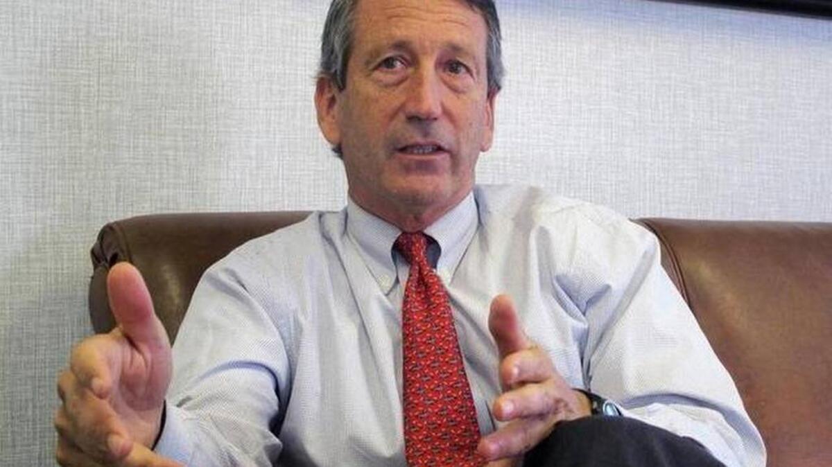 FILE - In this Dec. 18, 2013, file photo, U.S. Rep. Mark Sanford, R-S.C., discusses his first months back in Congress during an interview in Mount Pleasant, S.C. Bruce Smith AP