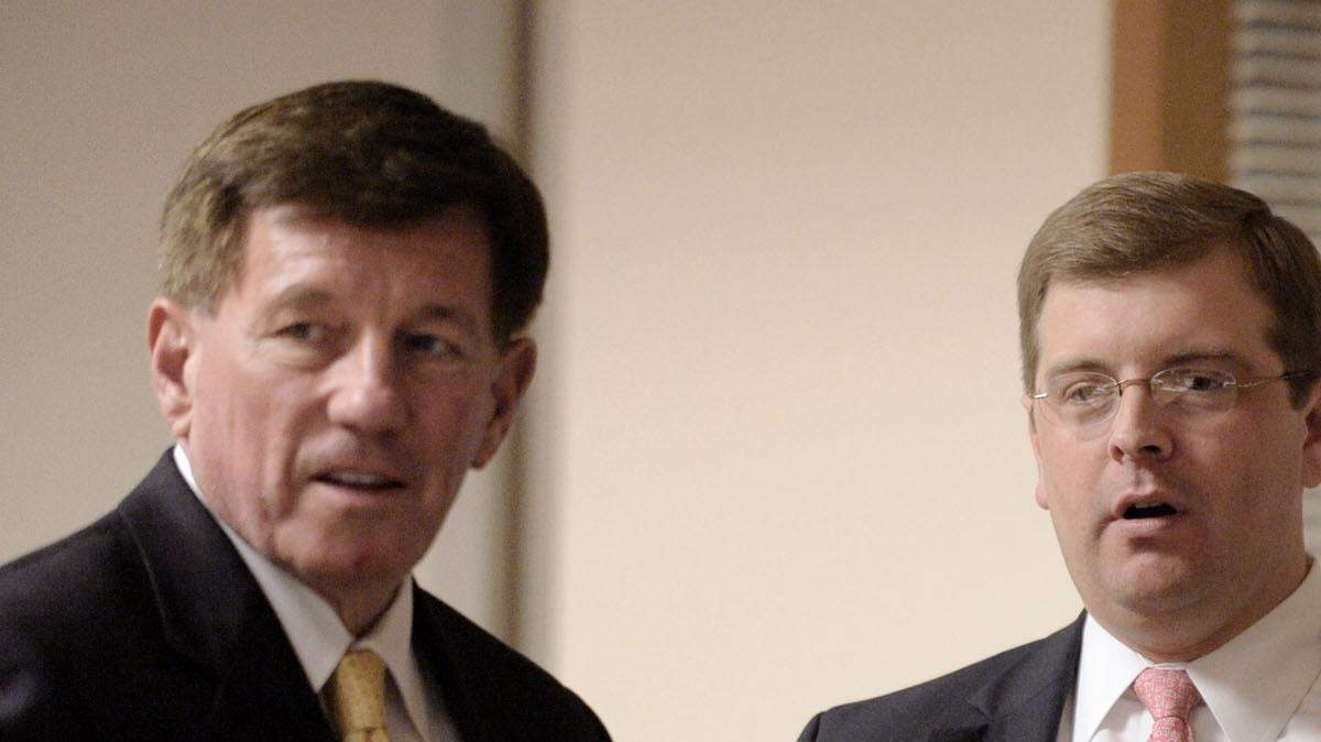 Drew Davis, center, is seen with other lawyers for the Winston-Salem/Forsyth County Schools in this photo taken on Sept. 7, 2010 before the school board went into executive session. Davis is now the the Beaufort County School District’s attorney.