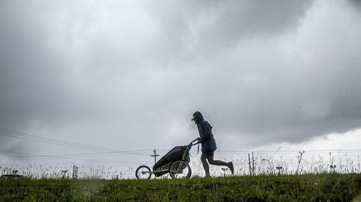 Marshall Hardee of Conway runs U.S. 501 in the rain to complete the last leg of a coast to coast journey that began in Oceanside, CA and ended at Second Avenue Pier in Myrtle Beach. Hardee, age 22, ran 2,727 miles from in 135 days pushing camping gear in a cart and sleeping on the roadside. Hardee said that he wants to tell people, "If you have a dream, no matter how wild it is, go ahead and do it." Thursday, June 22, 2017.