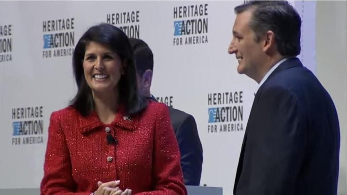 Gov. Nikki Haley asks U.S. Sen. Ted Cruz a question during a forum in Greenville in September.