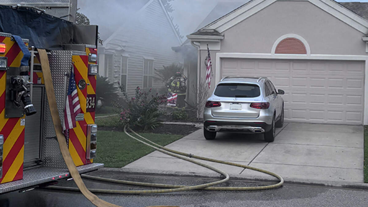 Firefighters finish extinguishing a fire on Pineapple Dr. in Sun City. The fire was brought under control within 20 minutes and fully extinguished within 50 minutes. Firefighters from Bluffton Township Fire District Stations 31 (New Riverside), 34 (Sun City), 35 (Fording Island Rd.), 37 (Palmetto Bluff), and 38 (Hampton Parkway) responded, alongside Beaufort County EMS.