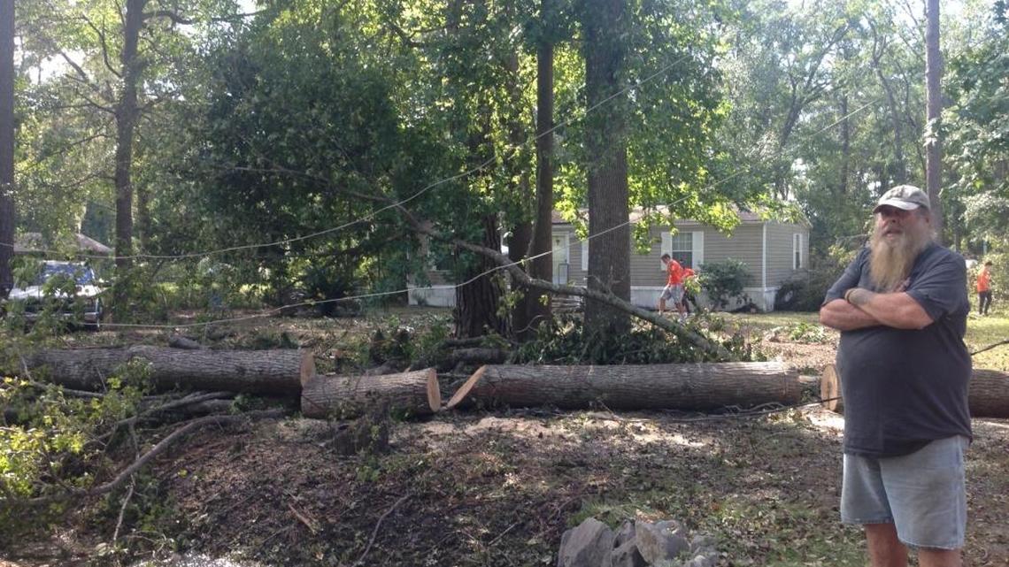 Volunteers with the charity Samaratain’s Purse help clean up Jerry “Gator” Burns’home off Confederate Ave. in Bluffton. Burns believes the home was in the path of a tornado during Hurricane Matthew.