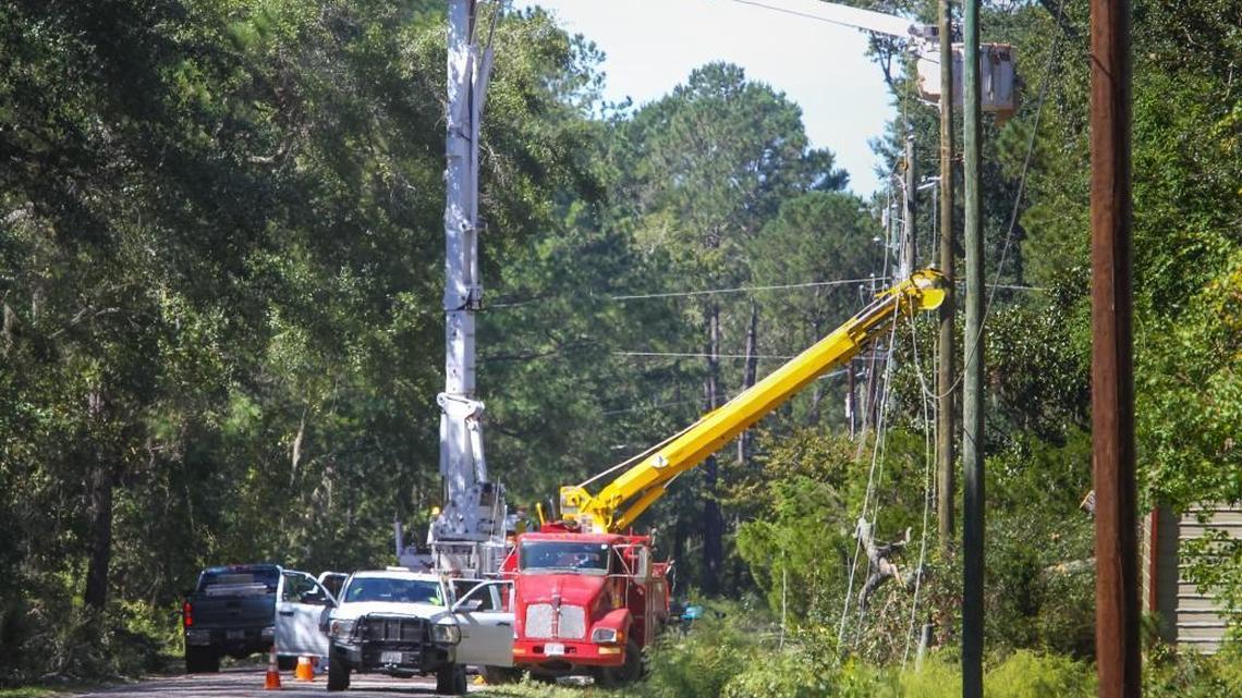 Power crews work to restore electricity on Clarendon Road near Seabrook on Oct. 10, 2016.