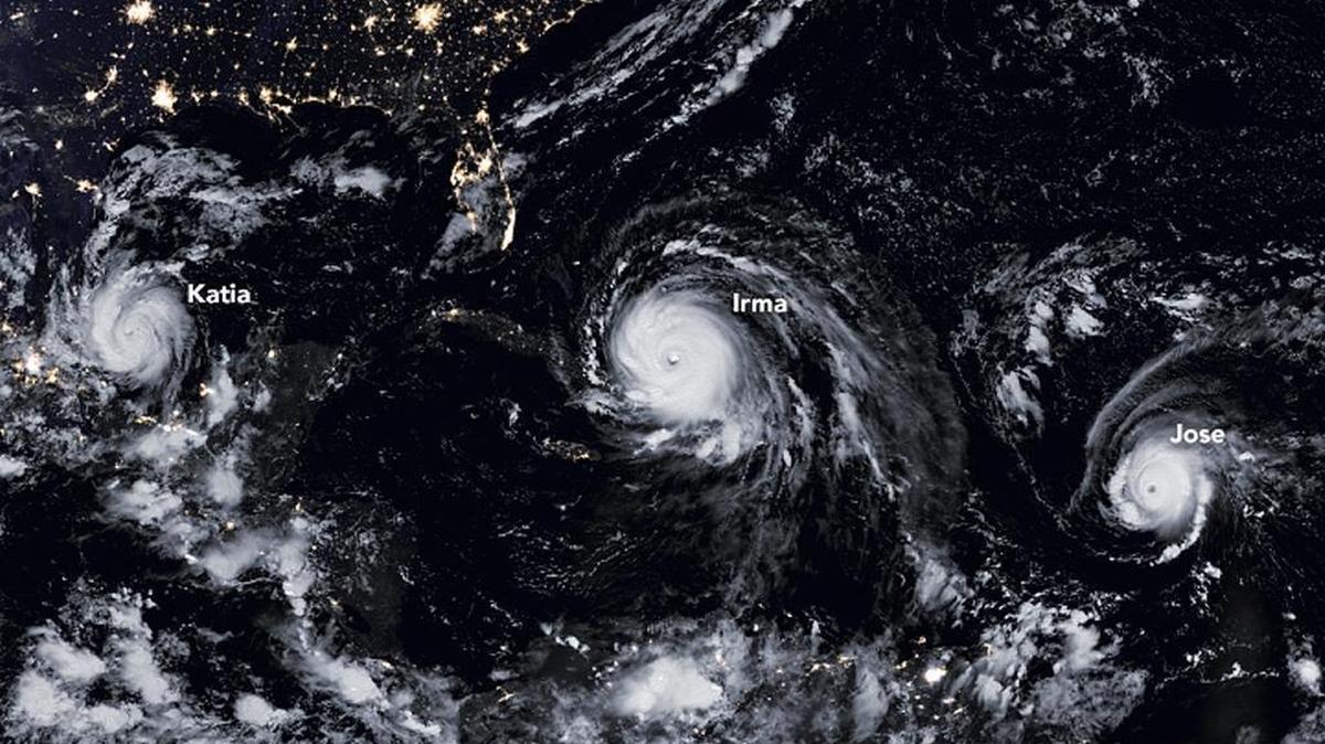 From left to right, hurricanes Katia, Irma and Jose spin at the same time on Sept. 8.