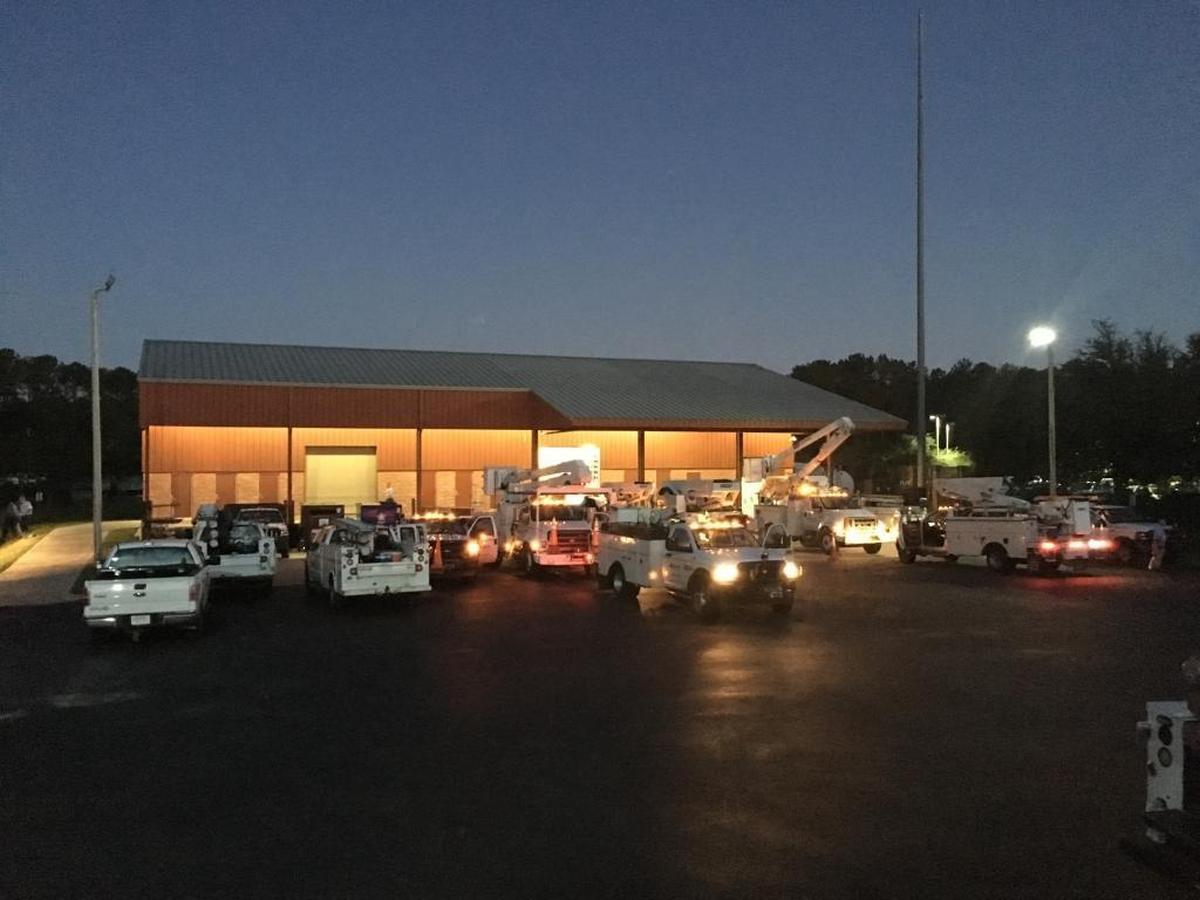 Palmetto Electric trucks leaving at first light on Oct. 14, 2016.