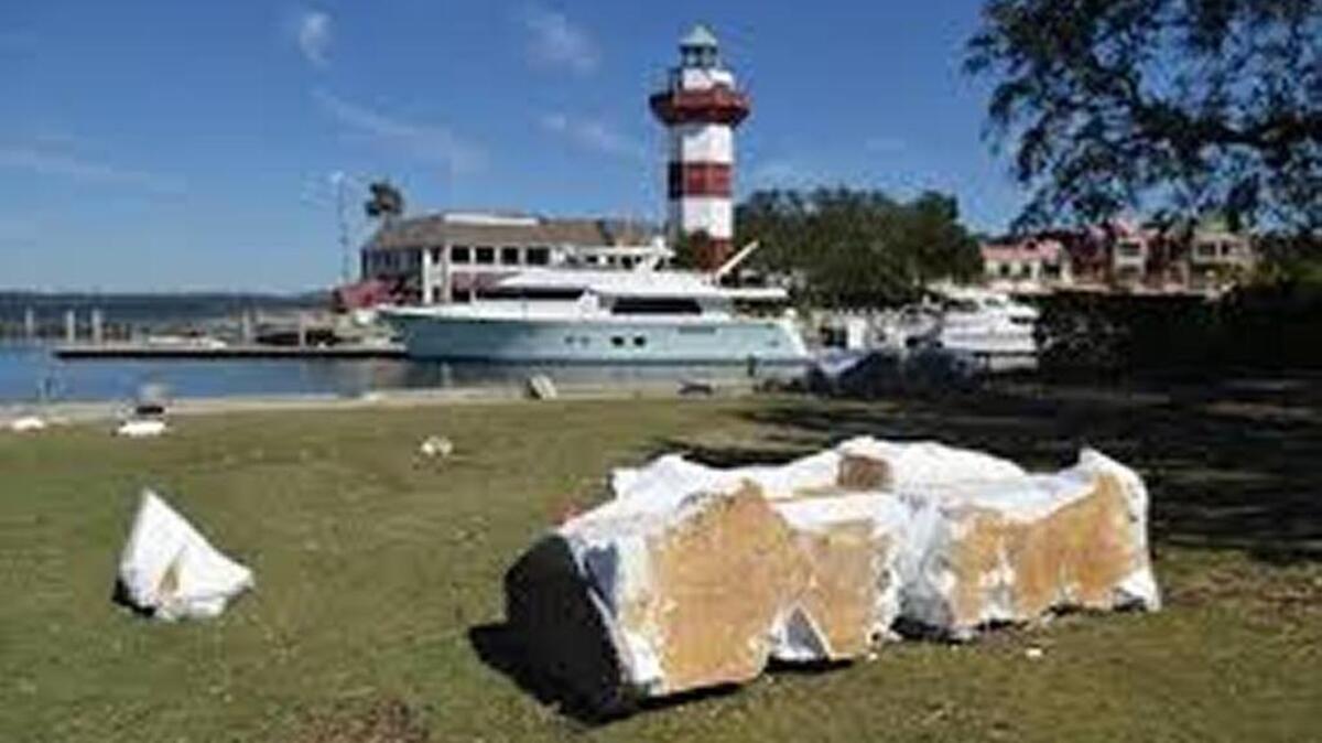 Rubble from the floating dock at Harbour Town has was thrown up on the apron of the 18th hole of Harbour Town Golf Links by the wind and waves of Hurricane Matthew in this photo taken Oct. 10, 2016.