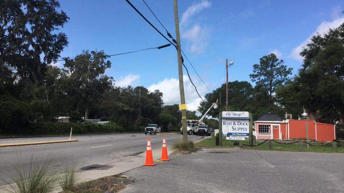 Ribaut Road was closed in both directions at Royal Palms Road near Taco Burger in Port Royal on Tuesday so crews could repair power lines damaged in Tropical Storm Irma.