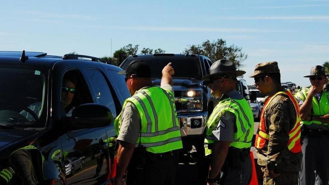 Conflicting messages from officials led some to believe Hilton Head Island was re-open to the public after Hurricane Matthew long before barricades were lifted. Emergency management and law enforcement personnel had to raise their voices and tell some drivers they would be escorted off the bridge to convince them to turn around at the island checkpoint on Oct. 10, two days after the storm. The island would re-open the next day.