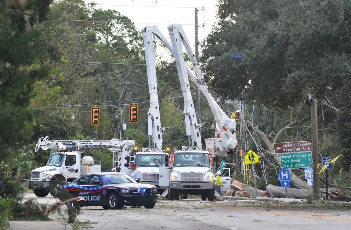 Electrical crews remove damaged power lines and poles and replace them on Ribaut Road on Oct. 8, 2016, fewer than 24 hours after Hurricane Matthew did significant damage to the electrical infrasctructure along Ribaut Road and the rest of Beaufort County. By late afternoon, multiple crews were busy repairing what Matthew had destroyed.