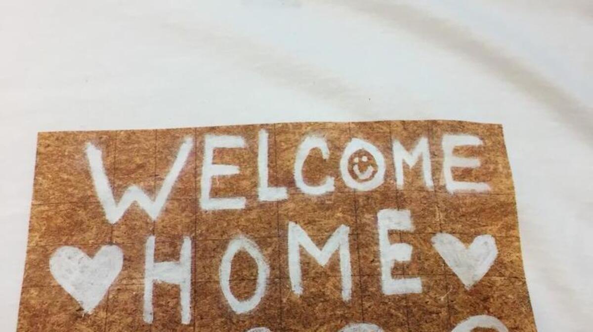 A T-shirt of the Hilton Head “Welcome Home” sign from Hurricane Matthew will raise money for the Deep Well social services agency.